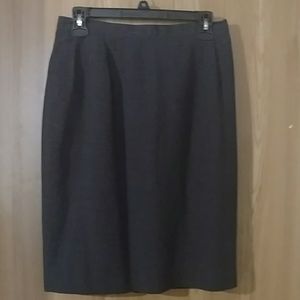 Charcoal grey skirt.